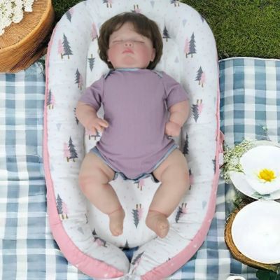 Réducteur_de_lit_bébé_sapin_rose_pratique