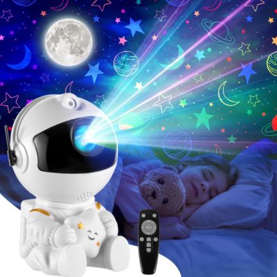 veilleuse projection astronaute blanc Project sur le plafond un spectacle céleste apaisant dans la chambre de petite fille qui dors sur son lit serrer son toutou dans ces bras